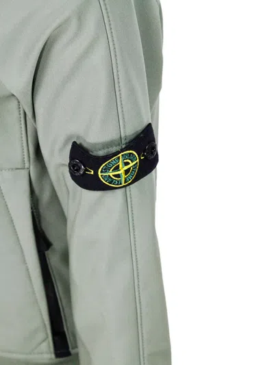 Stone Island Jacket In Water Resistant Technical Fabric With Hood And Zip Closure. Logo Applied On The Sleeve In Gray