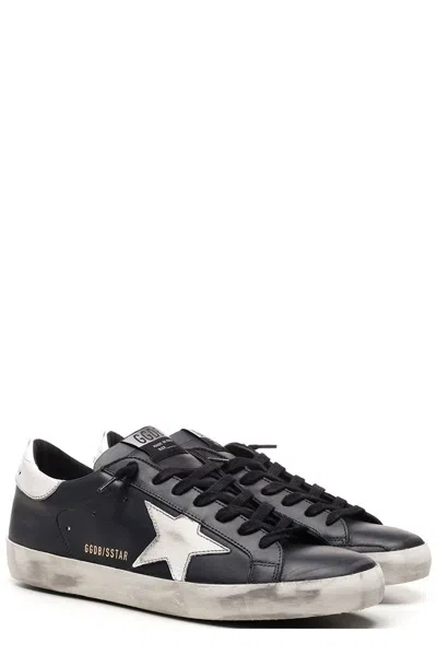 Golden Goose 'super-star' Black Low Top Sneakers With Logo Patch And Suede Details In Leather Man In Black