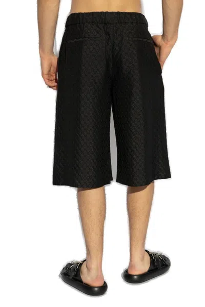 Alexander Mcqueen Skull Jacquard Pattern Shorts In Black