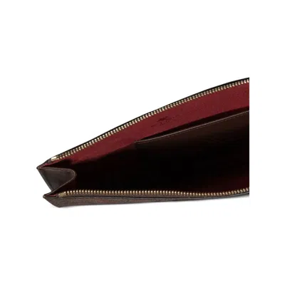 Etro Brown Clutch Bags
