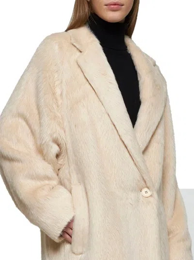 Mm Studio Coats  In Gold