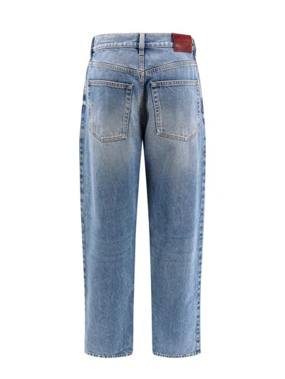 Gucci Logo Patch Faded Jeans In Blue