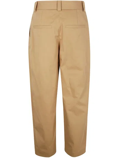 Khaite Cotton Straight-leg Trousers In Yellow
