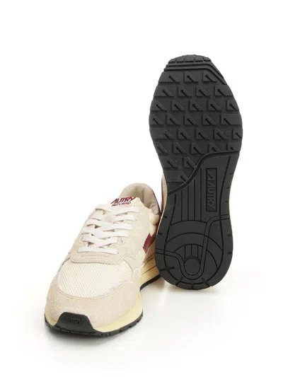 Autry Low Suede Net Sneakers With Contrast Panel In Neutral