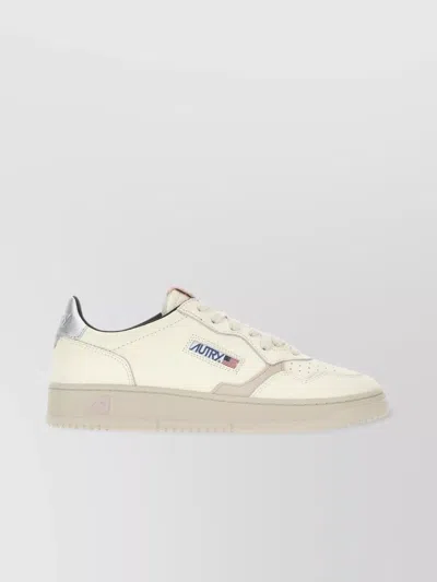 Autry Leather Sneakers With Rubber Sole And Perforated Toe Cap In Neutral