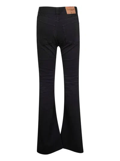 Balenciaga Flared Trousers With High Waist And Raw Hem In Black