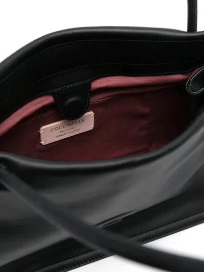 Coccinelle Calfskin Shoulder Bag With Adjustable Drawstring Sides In Black