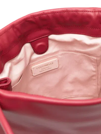 Coccinelle Logo Embossed Drawstring Tote Bag In Red