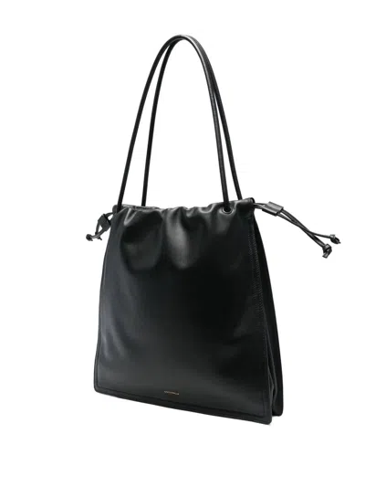 Coccinelle Black Vitello Leather Handbag With Drawstring Closure