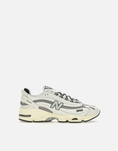 New Balance Grey Low Top Sneakers With Logo Patch On Side And Tongue And Perforated Panels In White