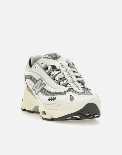 New Balance Grey Low Top Sneakers With Logo Patch On Side And Tongue And Perforated Panels In White