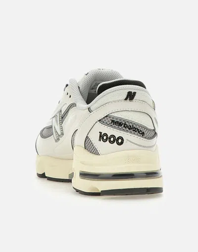 New Balance Grey Low Top Sneakers With Logo Patch On Side And Tongue And Perforated Panels In White