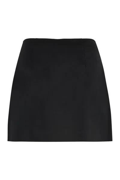 Prada Wool Mini Skirt With Oversized Pockets And Embellished Accents In Black