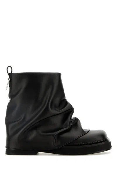 Attico 'mini Robin' Black Ankle Boots With Logo Plaque On The Rear And Pull-tab At The Heel In Blue