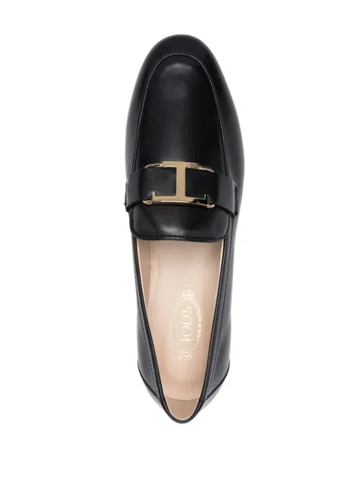 Tod's Leather Loafers With Subtle Gold Accent In Black