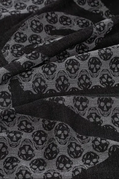 Alexander Mcqueen Multi-logo Wool Scarf With Fringed Edges In Black