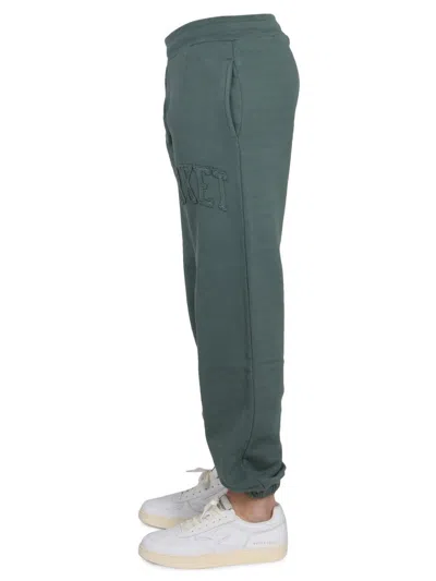 Market Trousers With Logo Detail And Pockets In Green