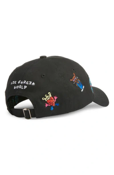 Vic Garcia World Good World Embroidered Adjustable Baseball Cap