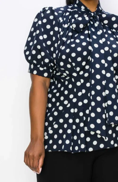 L I V D Minnie Polka Dot Tie Neck Stretch Top In Black