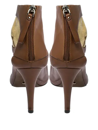 Pre-owned Sergio Rossi Vintage Cut-out Metal-detail Booties In Brown