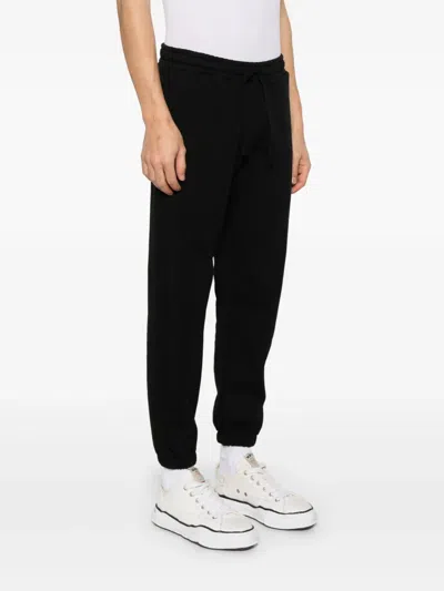 Garment Workshop Logo-embroidered Track Pants In Black