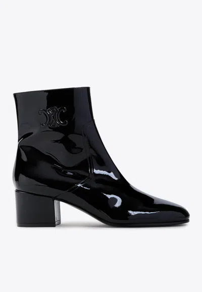 Celine Women Patent Leather Boots With Engraved Triomphe Logo In Black