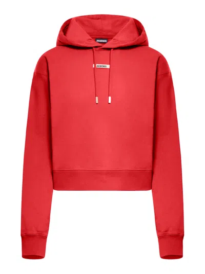 Jacquemus Cropped Hooded Drawstring Top In Red