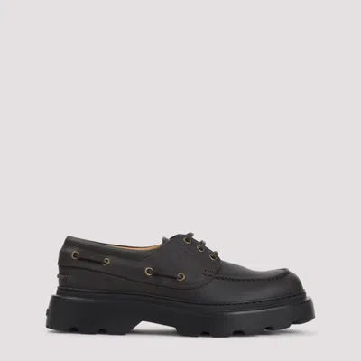 Tod's Leather Loafers Designed For Nautical Wear In Black