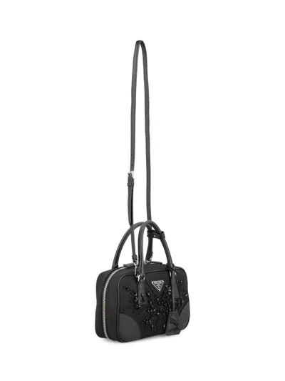 Prada Triangle Logo-embroidered Top Handle Bag In Black