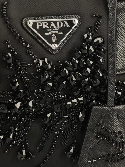 Prada Triangle Logo-embroidered Top Handle Bag In Black