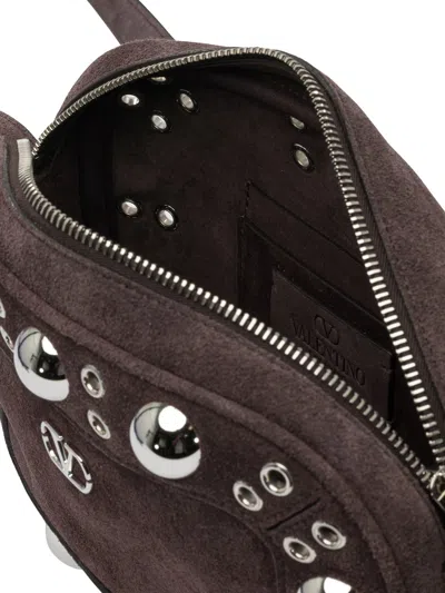 Valentino Garavani Dome-shaped Crossbody Bag With Metallic Eyelets And Adjustable Strap In Brown