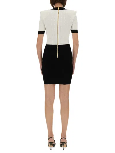 Balmain Fitted Black Dress With Ribbed Texture And Gold Accents