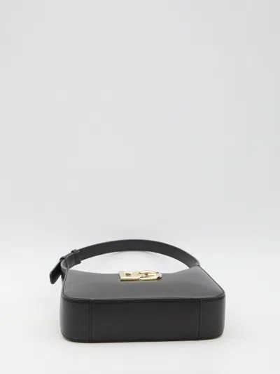 Dolce & Gabbana Curved Black Bag With Gold Logo Accents