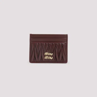 Miu Miu Lamb Leather Quilted Cardholder In Brown