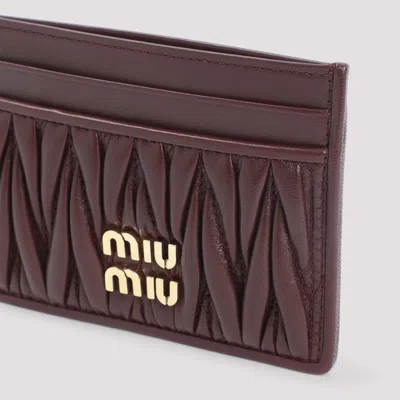 Miu Miu Lamb Leather Quilted Cardholder In Brown