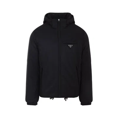 Prada Logo Plaque Puffer Jacket In Black
