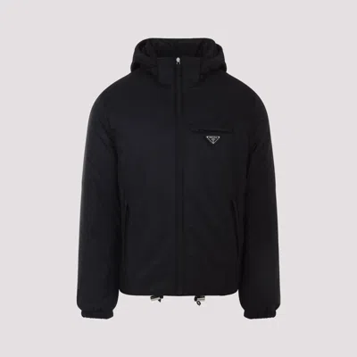 Prada Logo Plaque Puffer Jacket In Black