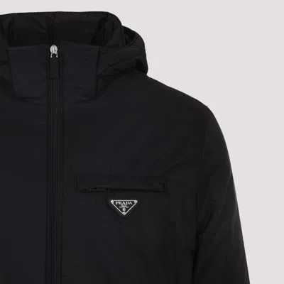 Prada Logo Plaque Puffer Jacket In Black
