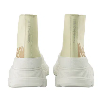 Alexander Mcqueen Tread Slick High-top Sneakers In Yellow
