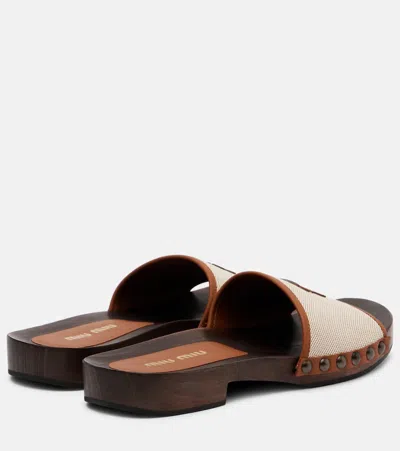 Miu Miu Canvas And Leather Studded Clog Sandals In Neutral