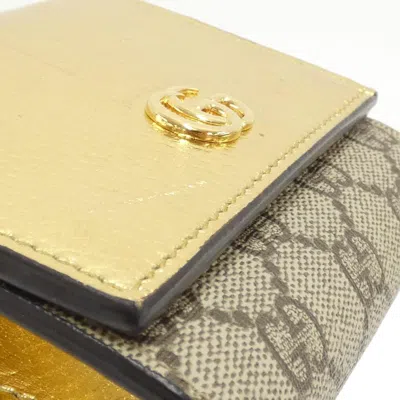 Pre-owned Gucci Beige Gold Gg Supreme Canvas Leather Wallet (bi-fold) () In Multi