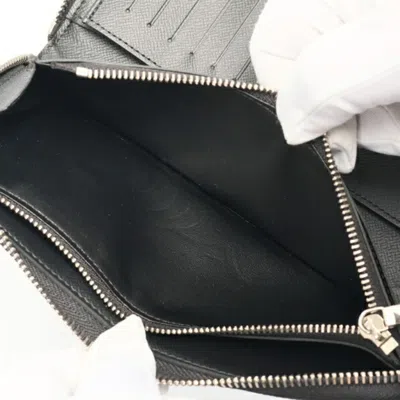 Pre-owned Louis Vuitton Black Noir Taiga Leather Long Wallet (bi-fold) ()