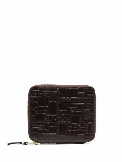 Comme Des Garçons Embossed Logotype Wallet By Comme Des Garcons