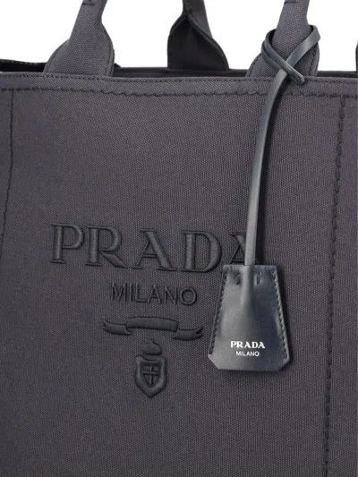 Prada Logo-embossed Tote Bag In Gray