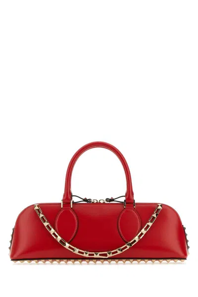 Valentino Garavani Handbags. In Red