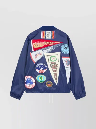 Champion Drawstring Hem Bomber With Elastic Cuffs And Patches In Blue