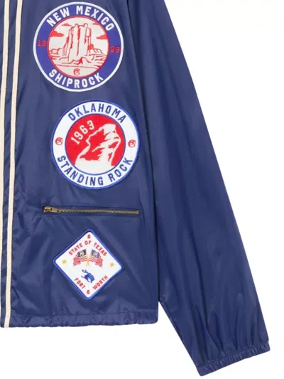 Champion Drawstring Hem Bomber With Elastic Cuffs And Patches In Blue