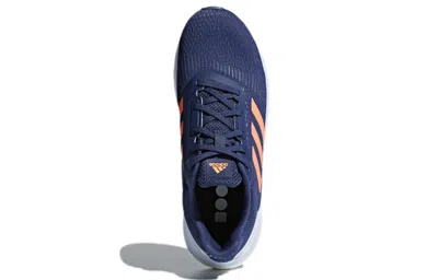 Adidas Originals (wmns) Adidas Response 'indigo Solar Orange' In Blue