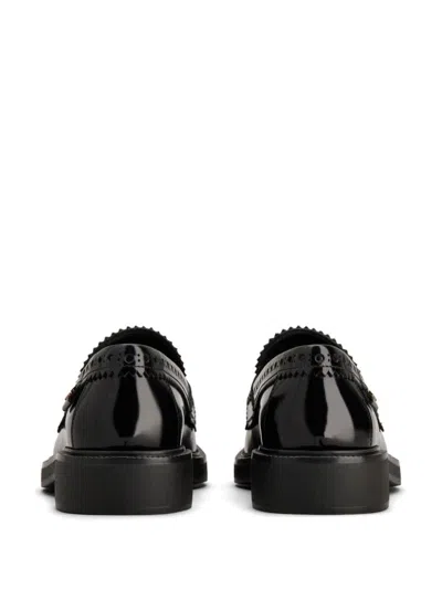 Tod's Hook Loafer Shoes