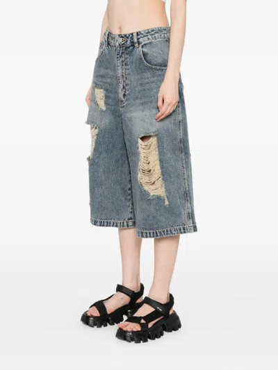 Tout A Coup Ripped Denim Shorts